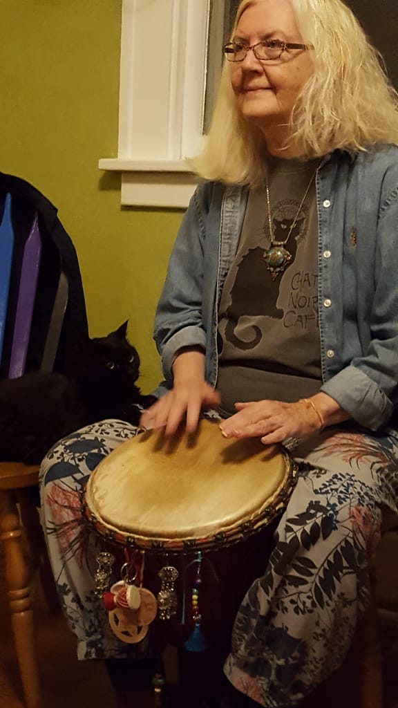 Judy playing the West African drum